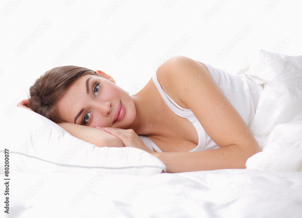 Beautiful girl lying in bedroom at early morning Beautiful girl lying in bedroom at early morning