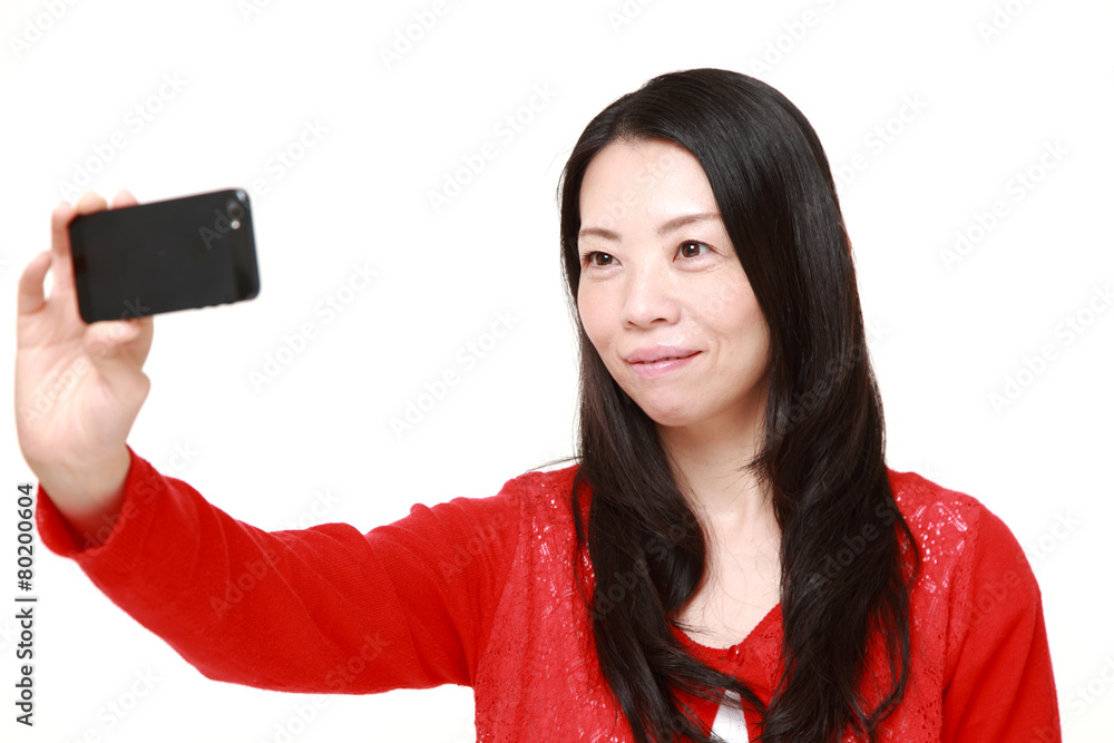 セルフィを撮る女性 セルフィを撮る女性