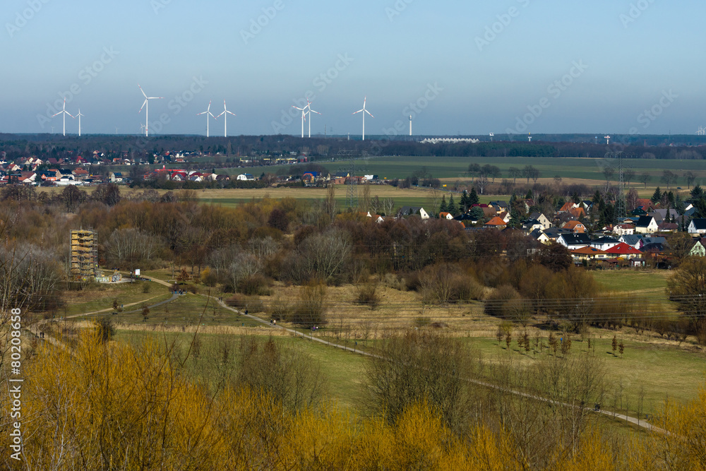 Suburban Natural Park and wind turbines in the background Suburban Natural Park and wind turbines in the background
