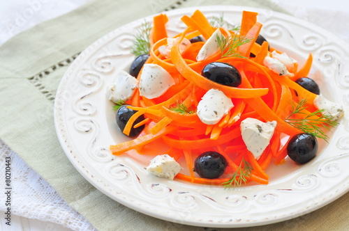 Carrot pasta salad with feta, olivs and dill photo