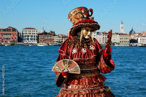 Carnival of Venice, Italy. Woman in costume and mask