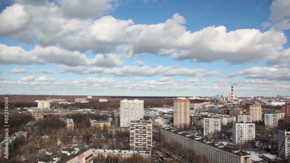a daytime blue sky and roofs of apartment buildings (further) a daytime blue sky and roofs of apartment buildings (further)