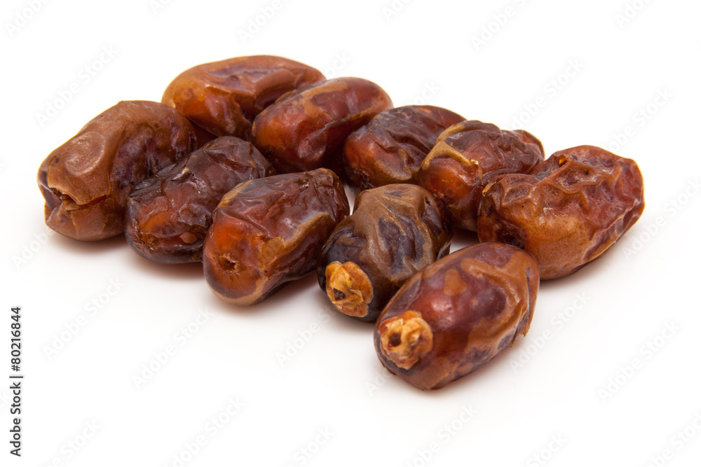 Medjool dates isolated on a white background. Medjool dates isolated on a white background.