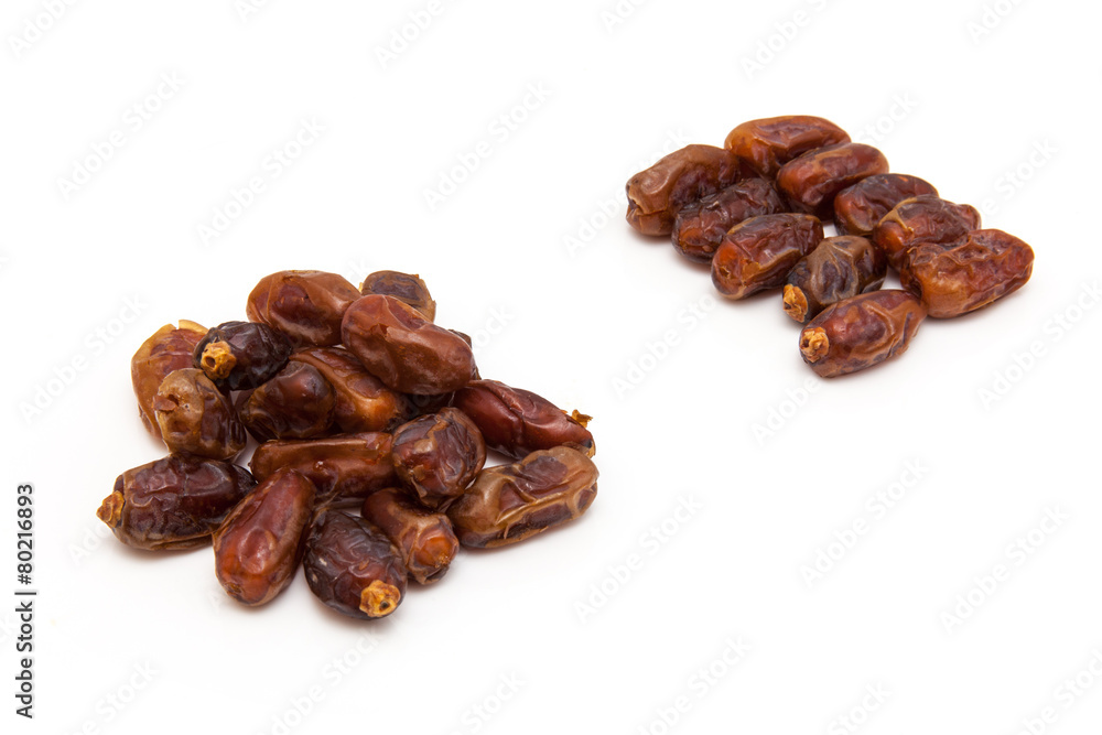 Medjool dates isolated on a white background. Medjool dates isolated on a white background.
