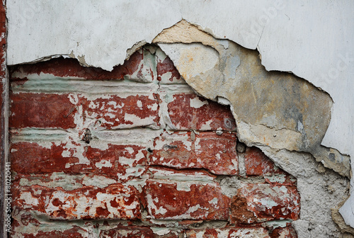 brick wall with plaster breakaway