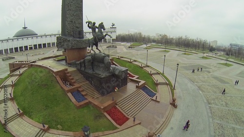 Monument with St. George piercing serpent near Central Museum