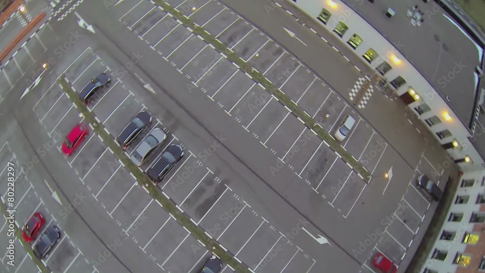 Parking place with several cars at evening. Aerial view Parking place with several cars at evening. Aerial view