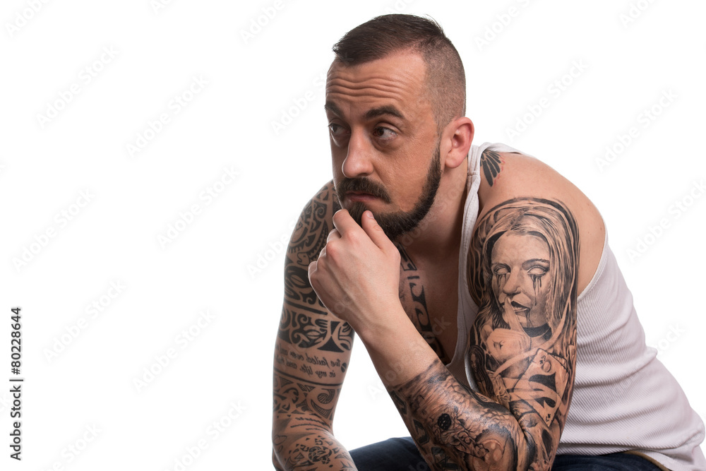 Man With Tattoo And Beard On White Background