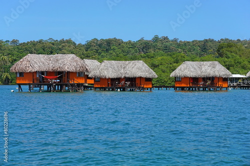 Tropical bungalows over water