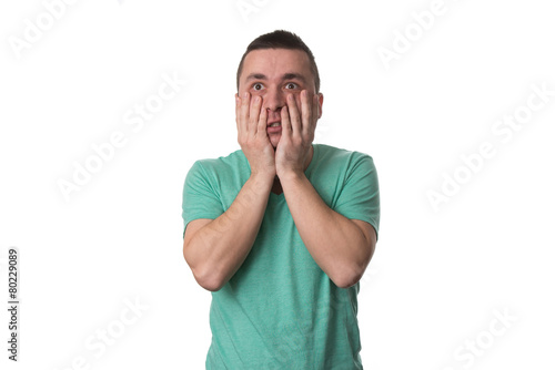 Stressed Man Covers His Face With Hands