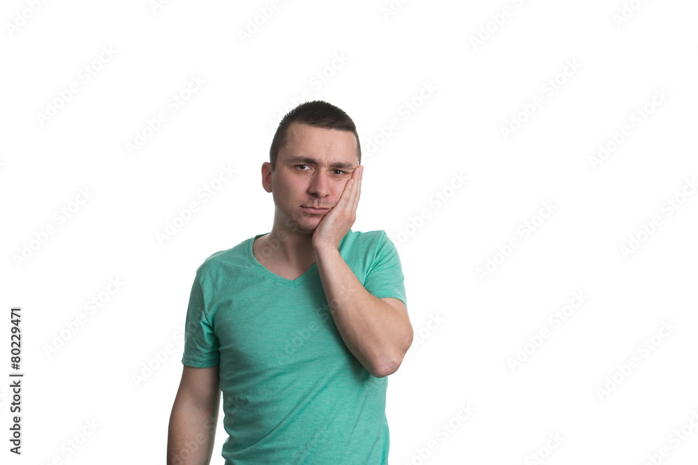 Man Suffering Tooth Pain On A White Background Man Suffering Tooth Pain On A White Background