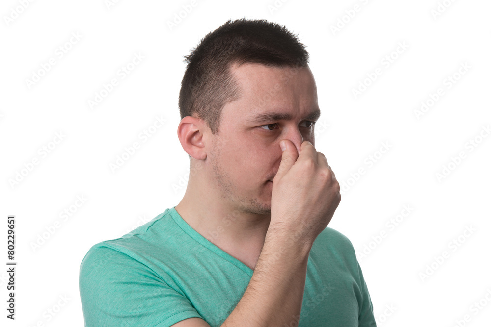 Man Touching His Nose And Has Unpleasant Pain