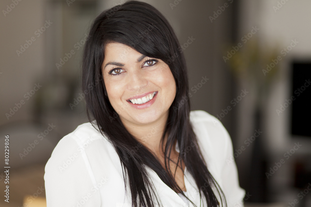 Portrait Of A Mature Woman smiling at the camera Portrait Of A Mature Woman smiling at the camera