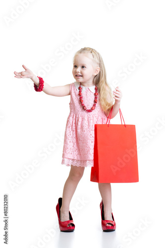 child girl trying her mom's...