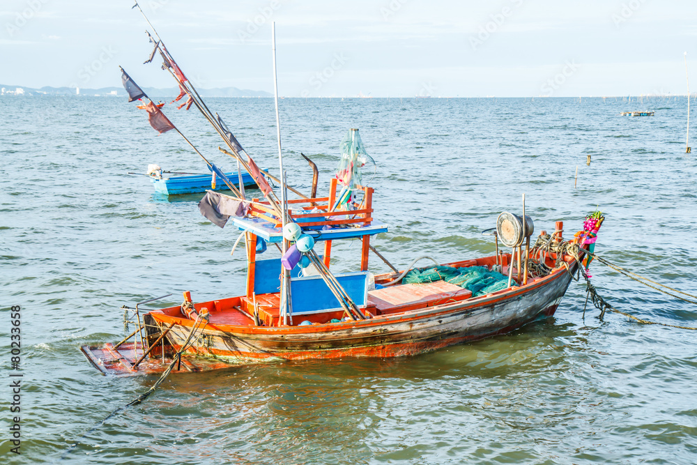 Small fishing boats on the beach Thailand