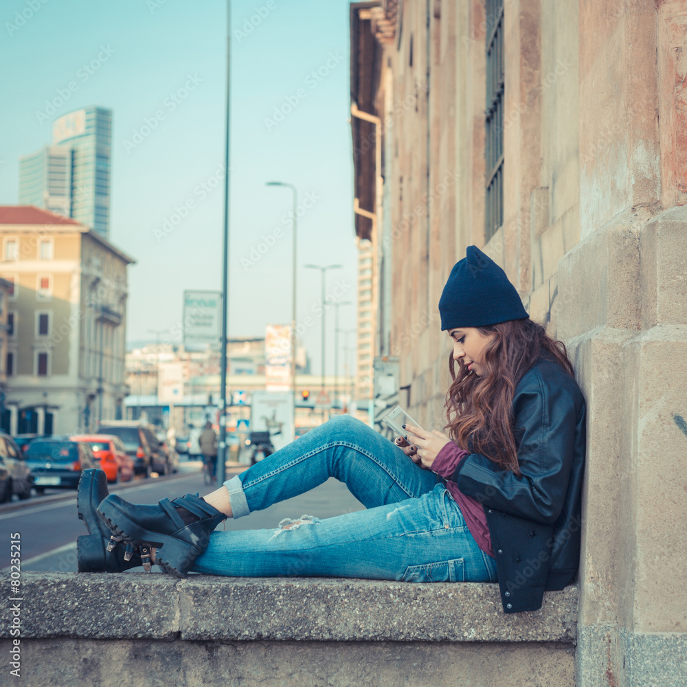 Beautiful girl posing in an urban context Beautiful girl posing in an urban context
