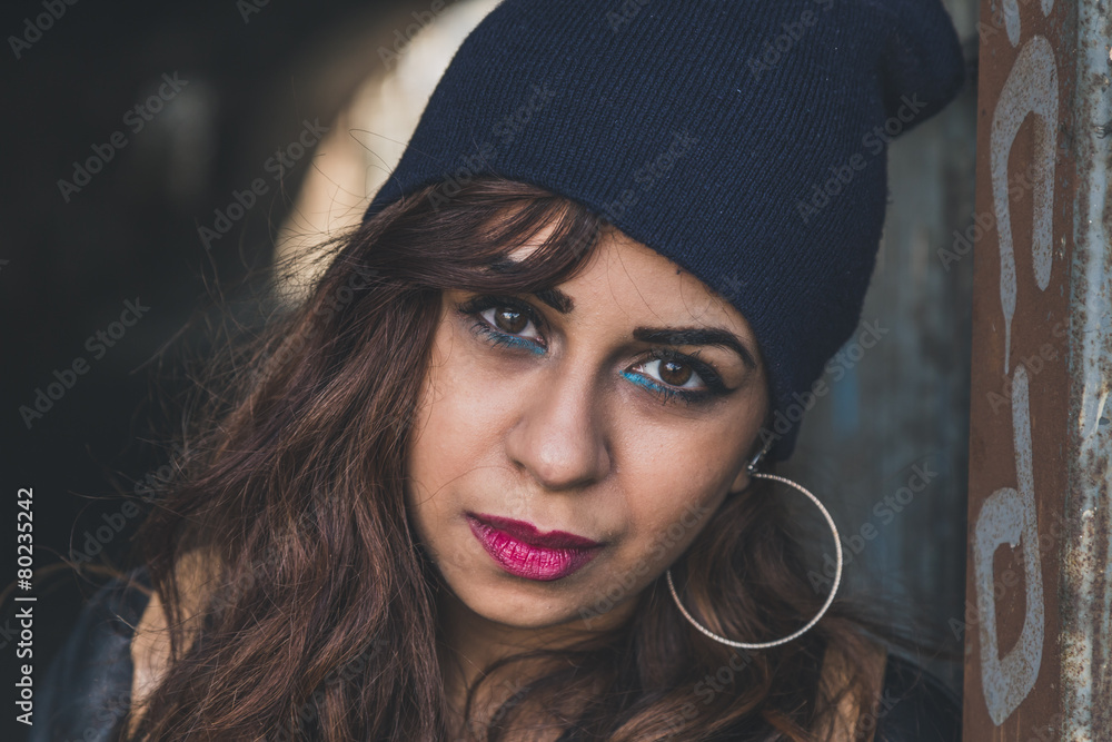 Beautiful girl posing in an urban context Beautiful girl posing in an urban context