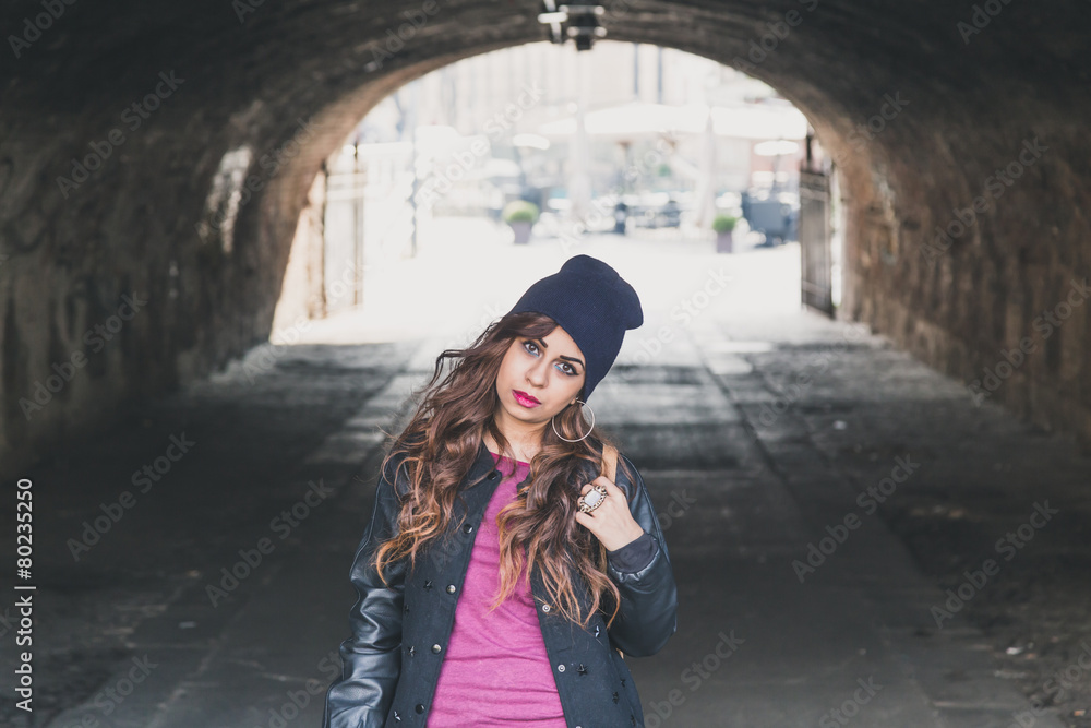 Beautiful girl posing in a tunnel Beautiful girl posing in a tunnel