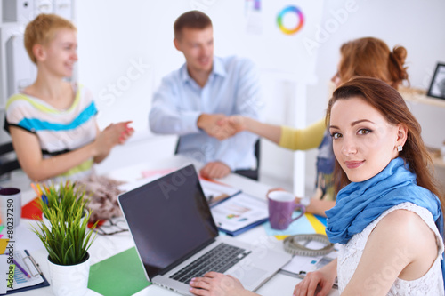 Business people shaking hands, finishing up a meeting