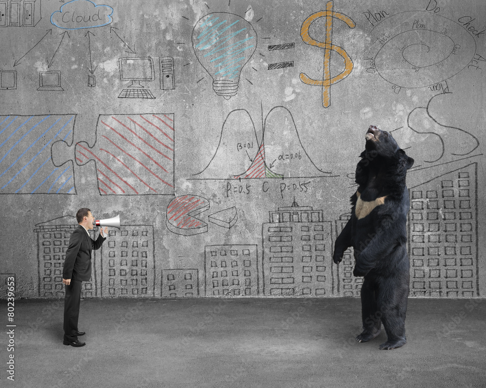 Businessman using megaphone yelling at black bear with doodles w Businessman using megaphone yelling at black bear with doodles w