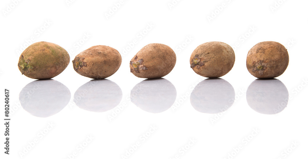Sapodilla or Ciku fruit over white background Sapodilla or Ciku fruit over white background