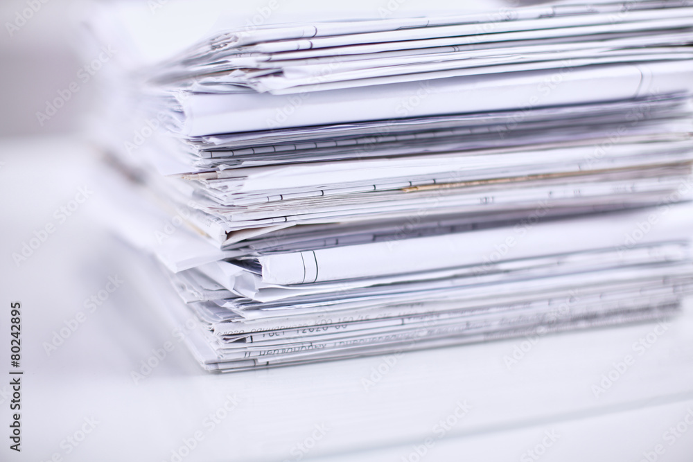 Big stack of papers ,documents on the desk Big stack of papers ,documents on the desk