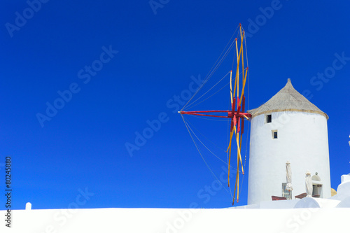 Typical cycladic windmill in Oia on Santorini island, Greece