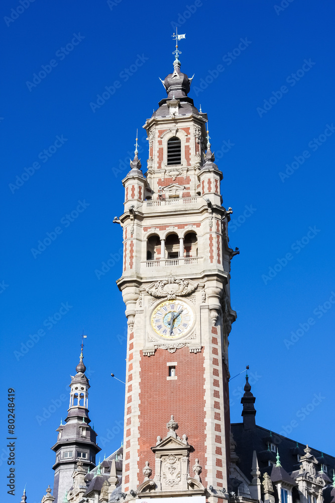Obraz premium Clock Tower at the Chambre de commerce in Lille, France