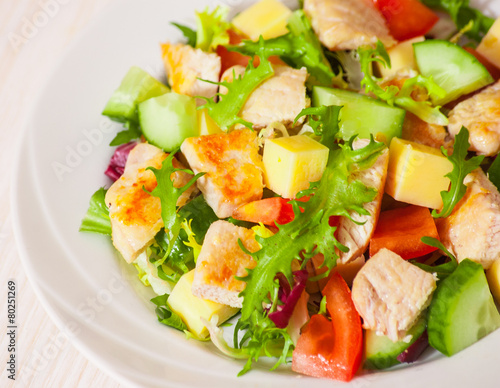 fresh vegetables salad with chicken and cheese