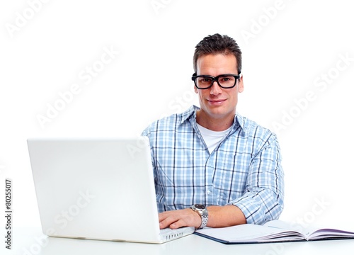 Man working with laptop computer.