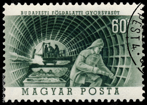 Stamp printed in Hungary shows construction of Metro in Budapest