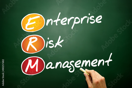 Enterprise Risk Management (ERM) business acronym on blackboard