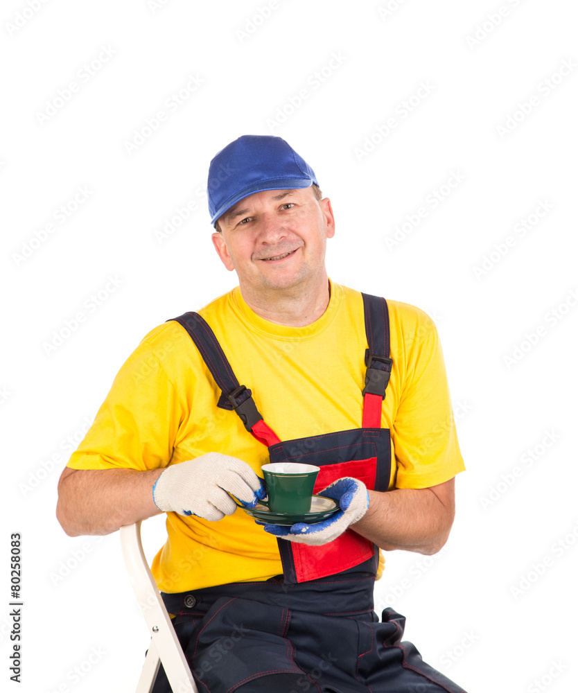 Worker with cup of tea.
