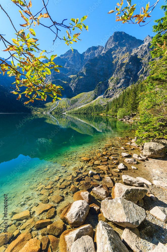 Green water mountain lake Morskie Oko, Tatra Mountains, Poland - obrazy, fototapety, plakaty 