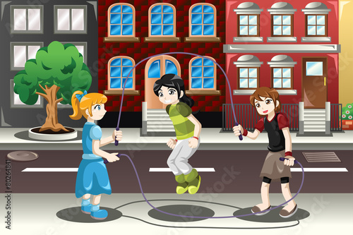 Kids playing double dutch