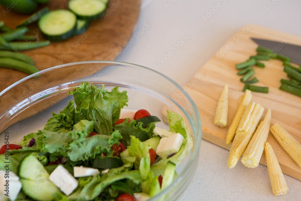 Salad and vegetables on table Salad and vegetables on table