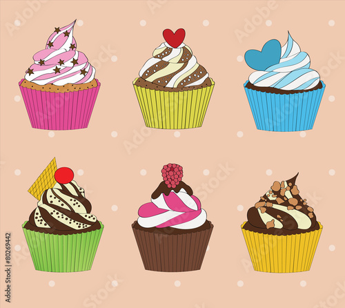 set of cupcakes on vintage background