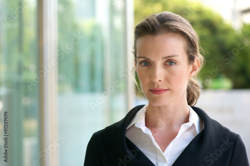 Attractive business woman with serious face expression