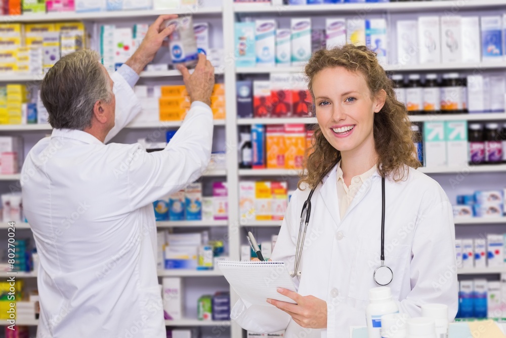 Pharmacists searching medicines with prescription Pharmacists searching medicines with prescription