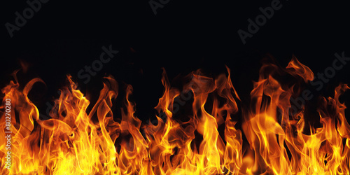 burning fire flame on black background photo