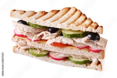 Sandwich with chicken and vegetables isolated on white