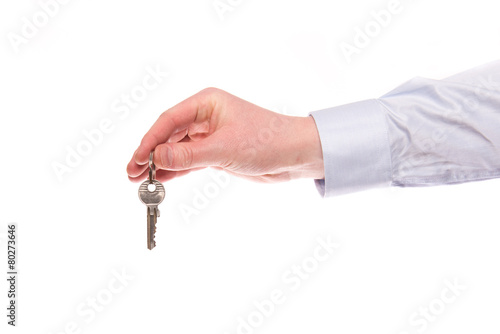 Hand with house key