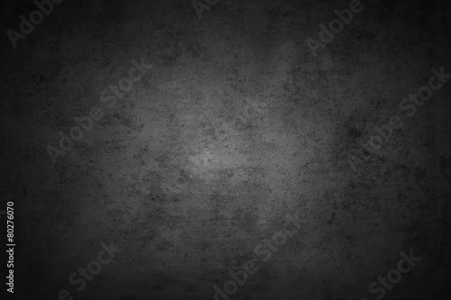 Grey stone concrete cement wall background. Dark edges