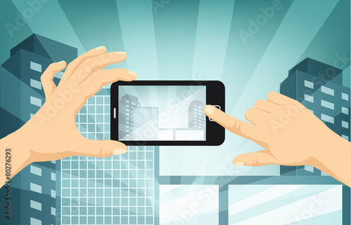 Hands with camera taking photo of night city