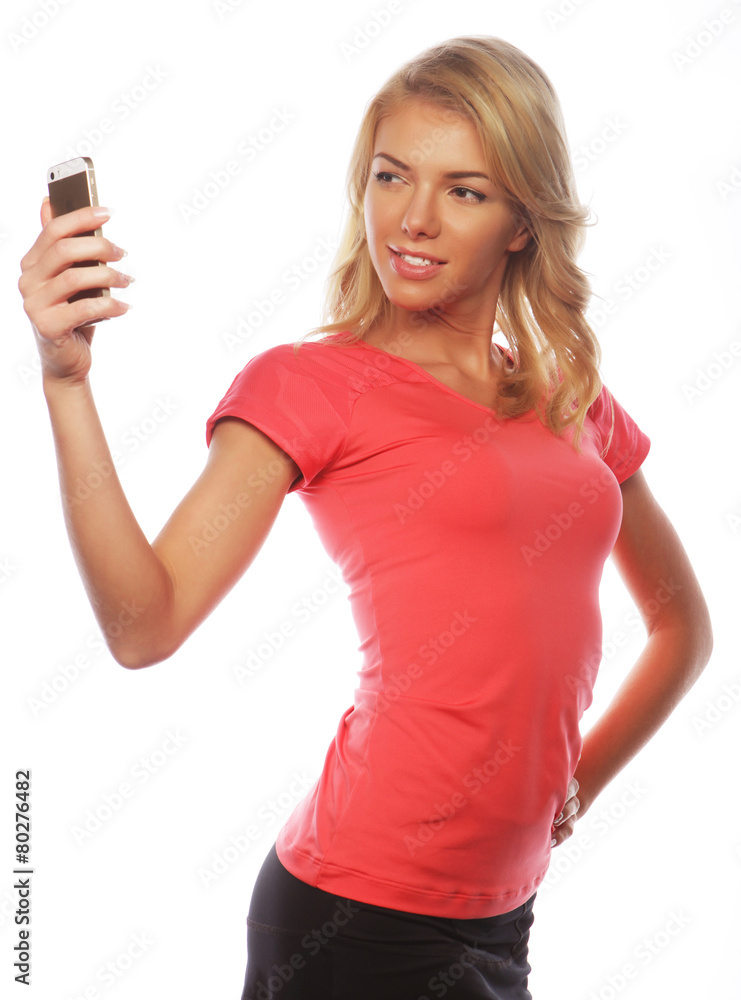 sporty blond woman making selfie sporty blond woman making selfie