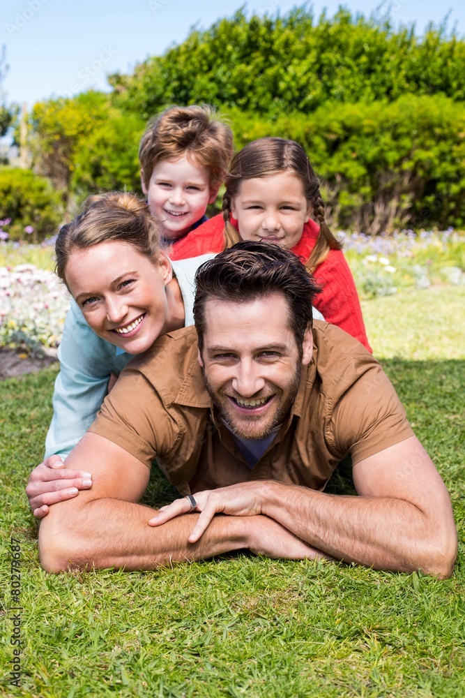 Happy family smiling at camera