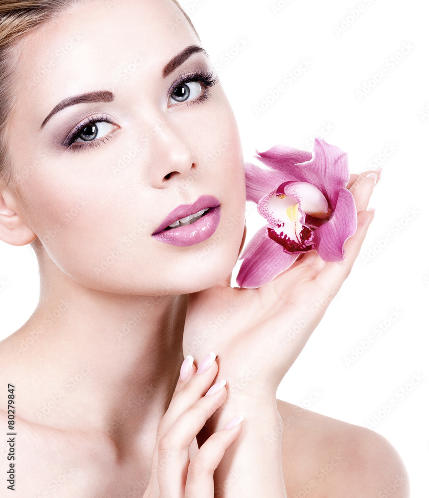face of a woman with purple eye makeup and lips face of a woman with purple eye makeup and lips