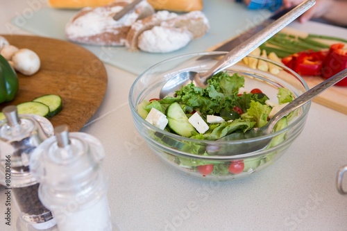 Family preparing salad