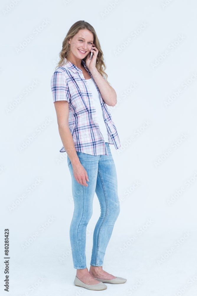 Pretty hipster calling with her smartphone Pretty hipster calling with her smartphone