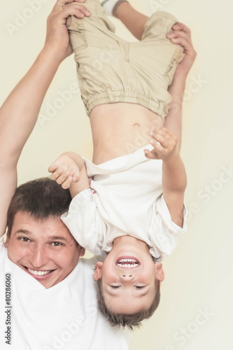 Family Concept: Father and His Little Son Having Great Time Toge